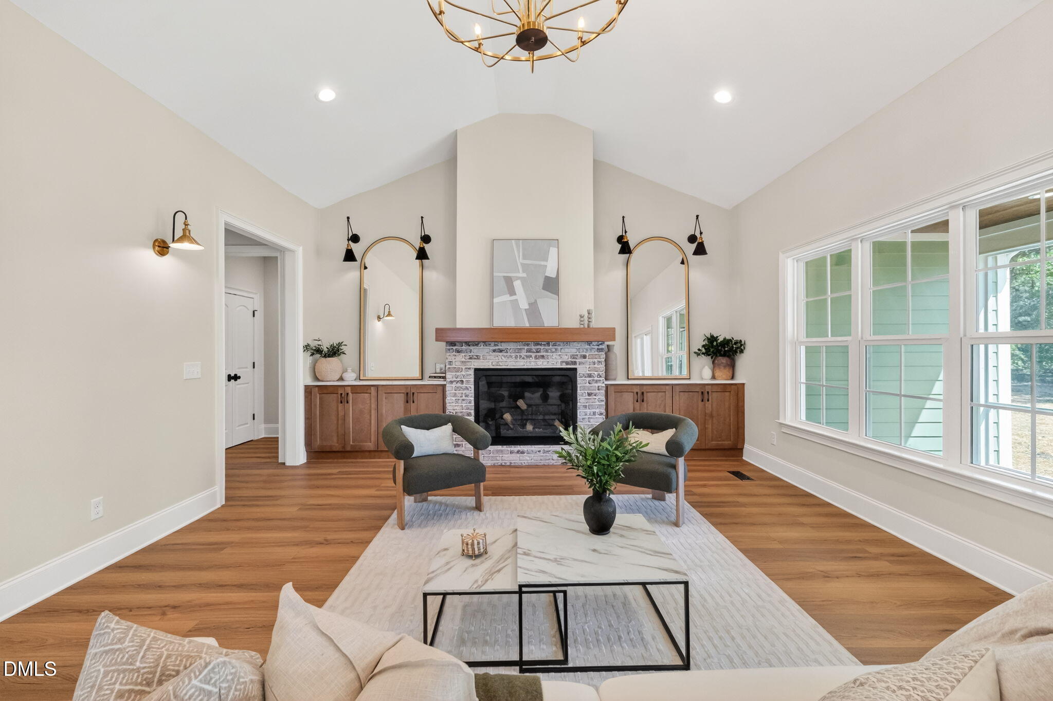 651 Dixon Road, Unit (LOT 2A) Willow Spring, NC 27592 - Photo 28 of 77 a living room with furniture and a fireplace