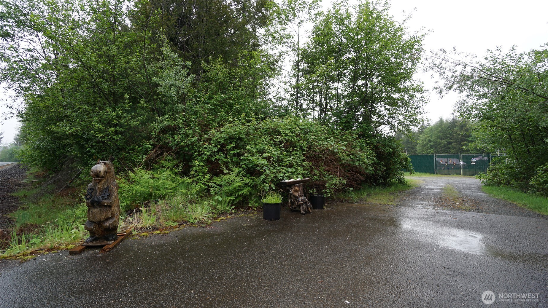 84 Hanson Road Hoquiam, WA 98550 - Photo 11 of 14 a view of a street with some trees