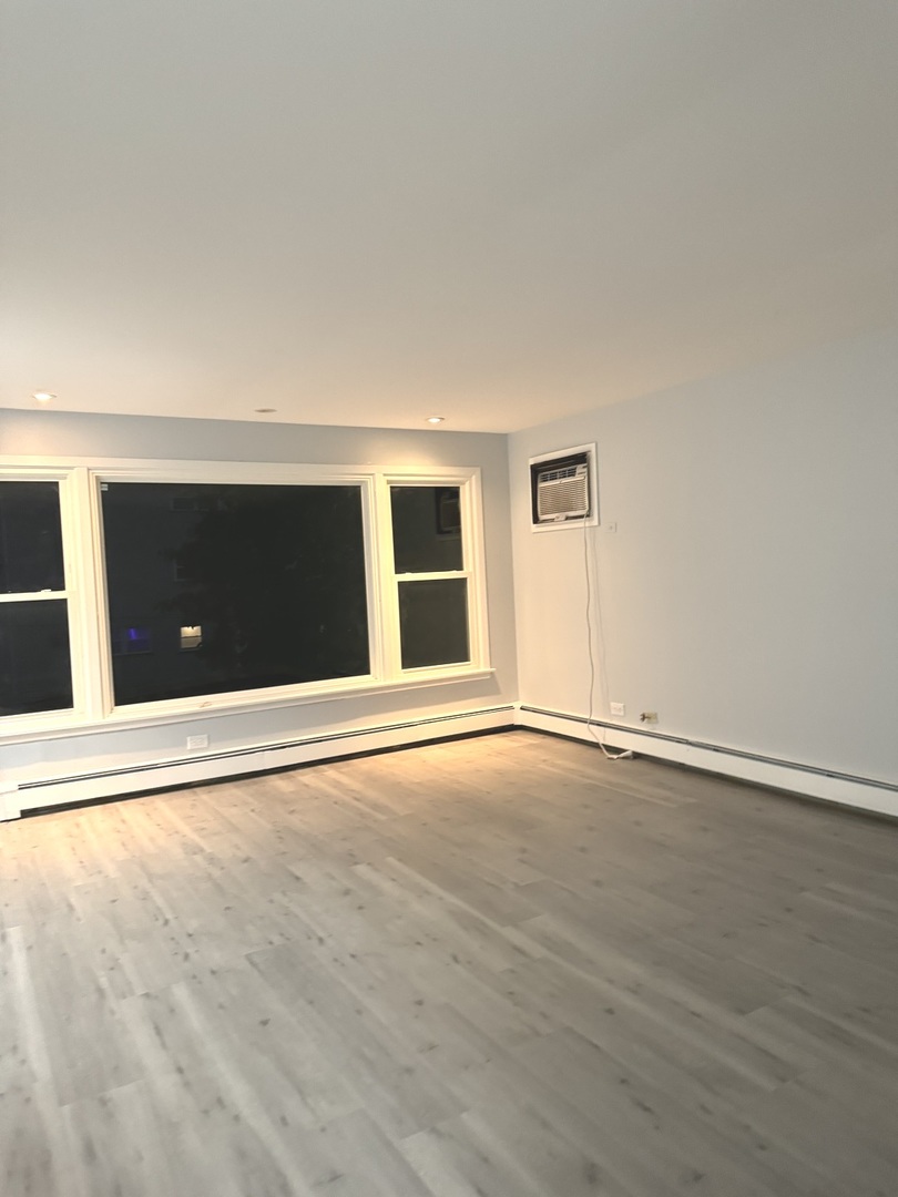 82 Luella Avenue, Unit 2 Calumet City, IL 60409 - Photo 3 of 12 a view of an empty room