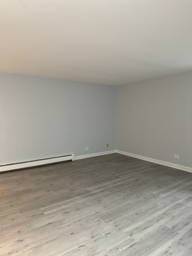 82 Luella Avenue, Unit 2 Calumet City, IL 60409 - Photo 5 of 12 a view of an empty room