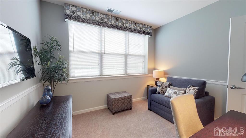 2106 Pine Valley Way Piscataway, NJ 08854 - Photo 22 of 26 a living room with furniture and a potted plant