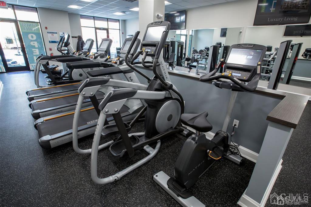 2106 Pine Valley Way Piscataway, NJ 08854 - Photo 7 of 26 a view of a room with gym equipment