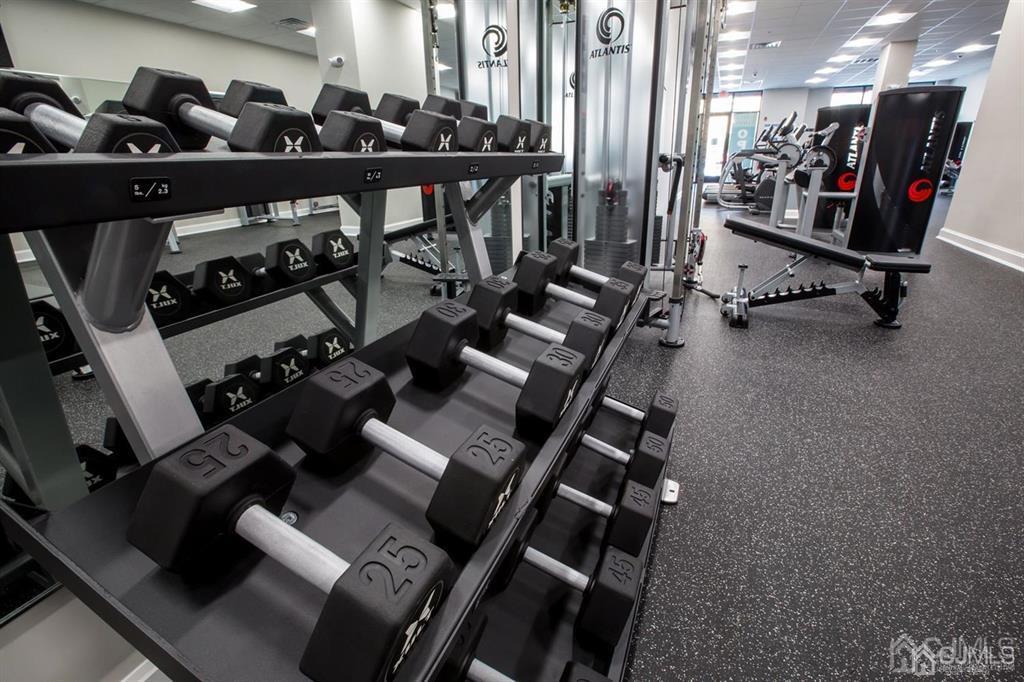 2106 Pine Valley Way Piscataway, NJ 08854 - Photo 8 of 26 a view of a room with gym equipment