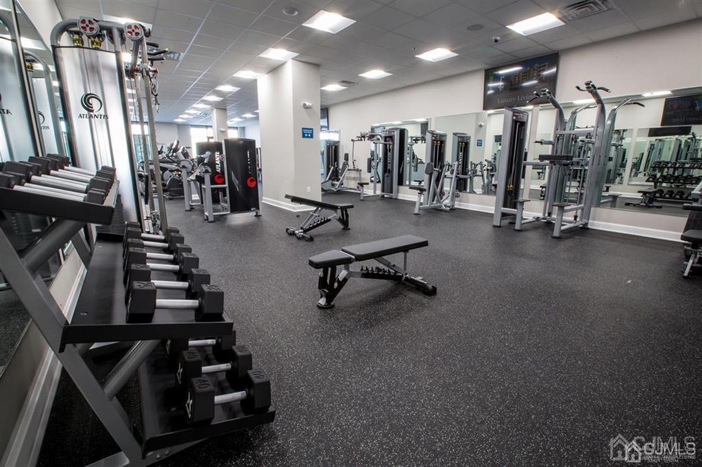 2106 Pine Valley Way Piscataway, NJ 08854 - Photo 9 of 26 a view of a room with gym equipment