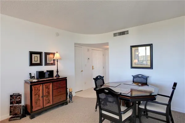 a view of a workspace with furniture