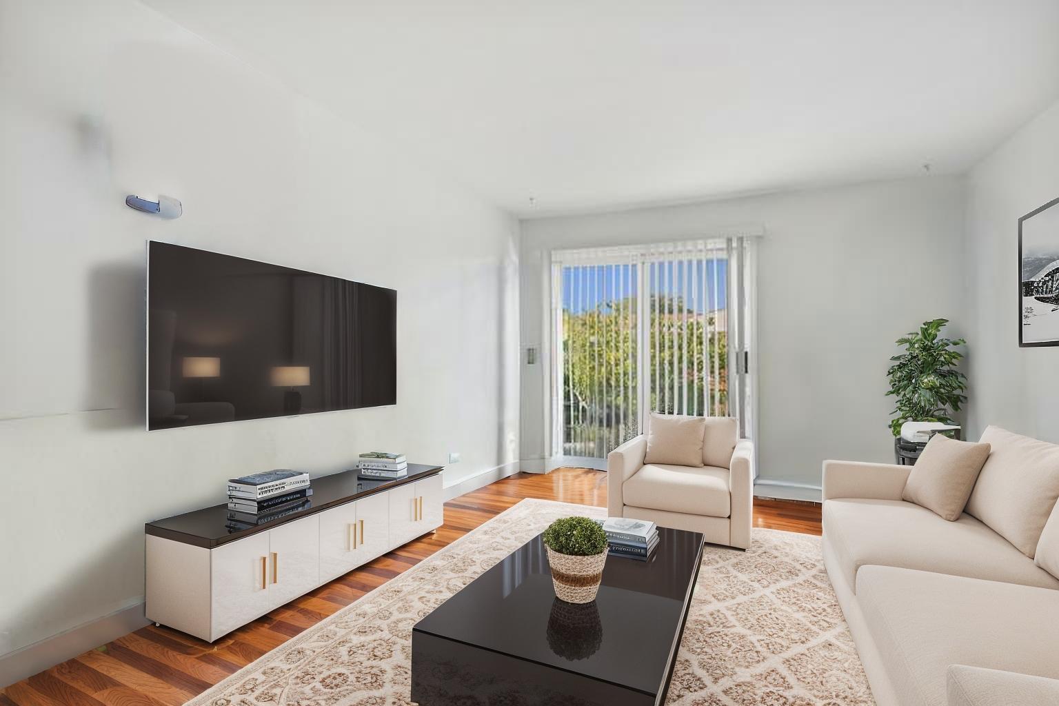 9561 Dee Road, Unit 2G Des Plaines, IL 60016 - Photo 4 of 18 a living room with furniture and a flat screen tv