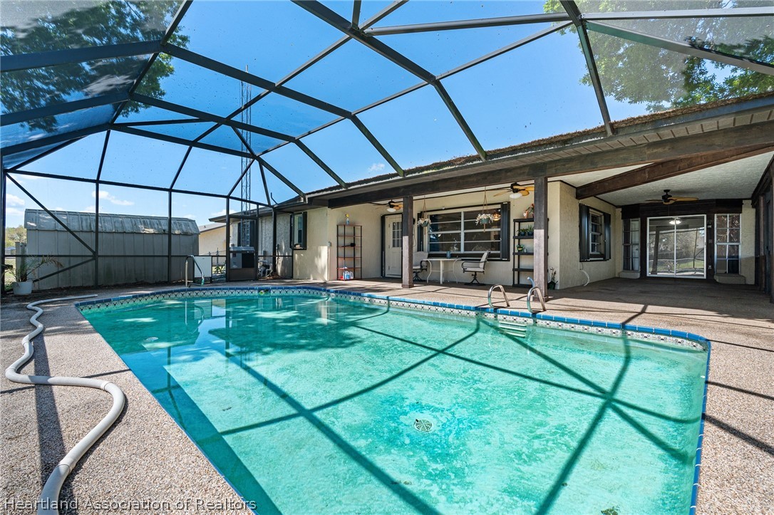 7100 Coral Ridge Road Sebring, FL 33876 - Photo 41 of 44 a view of a house with backyard