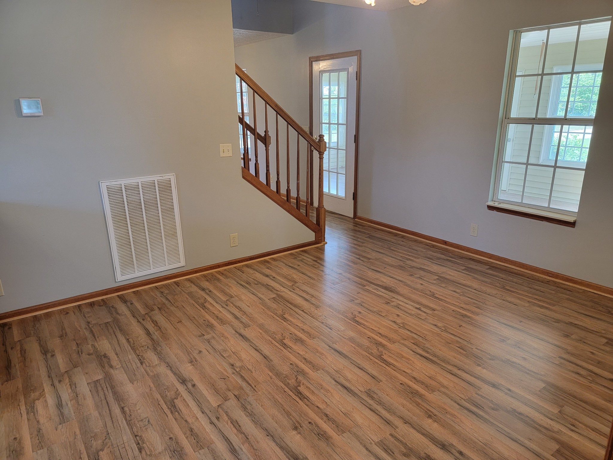 5814 Wayman Dunn Road Springfield, TN 37172 - Photo 24 of 65 wooden floor in an empty room with a window