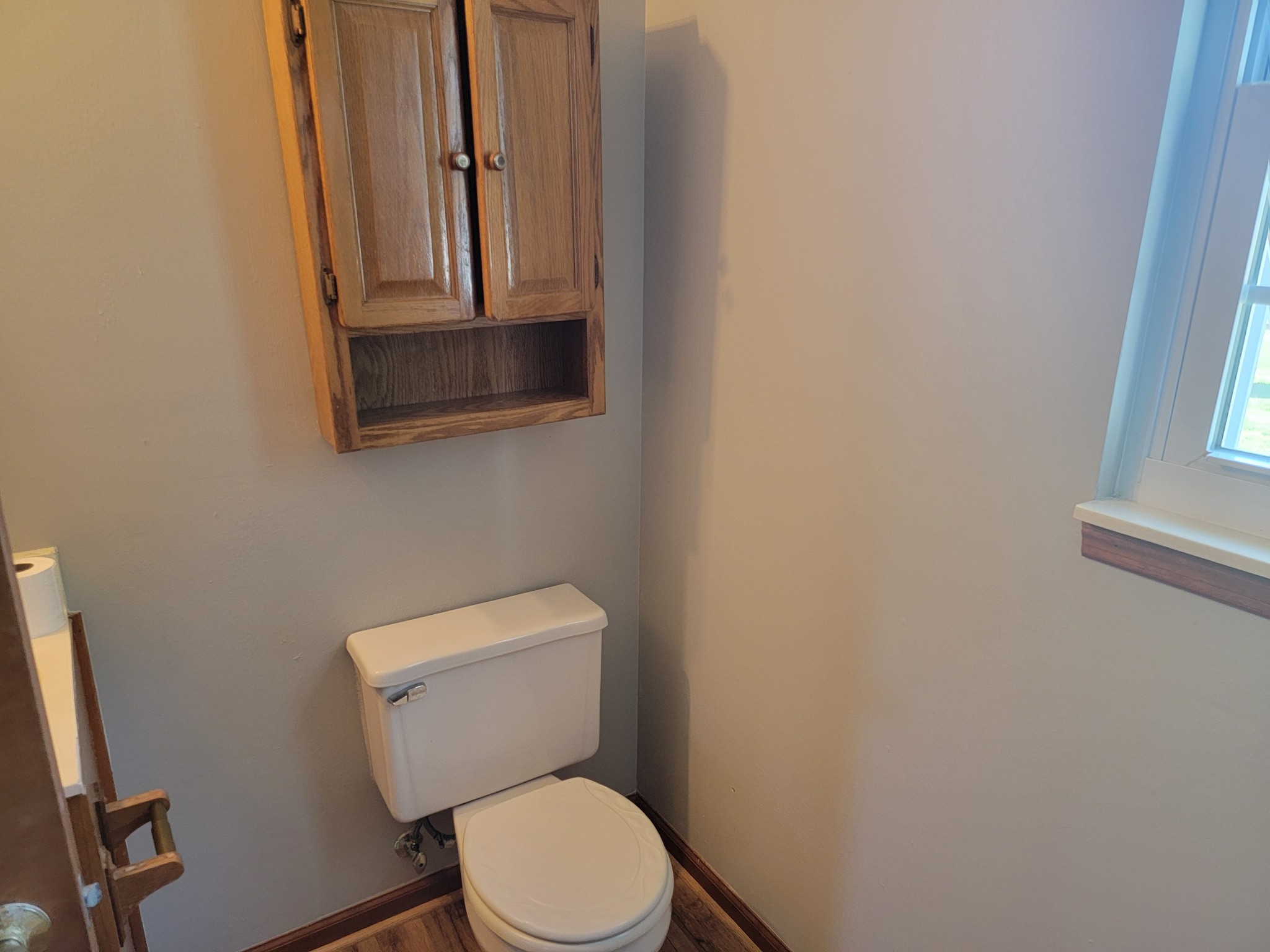 5814 Wayman Dunn Road Springfield, TN 37172 - Photo 40 of 65 a white toilet sitting next to a sink