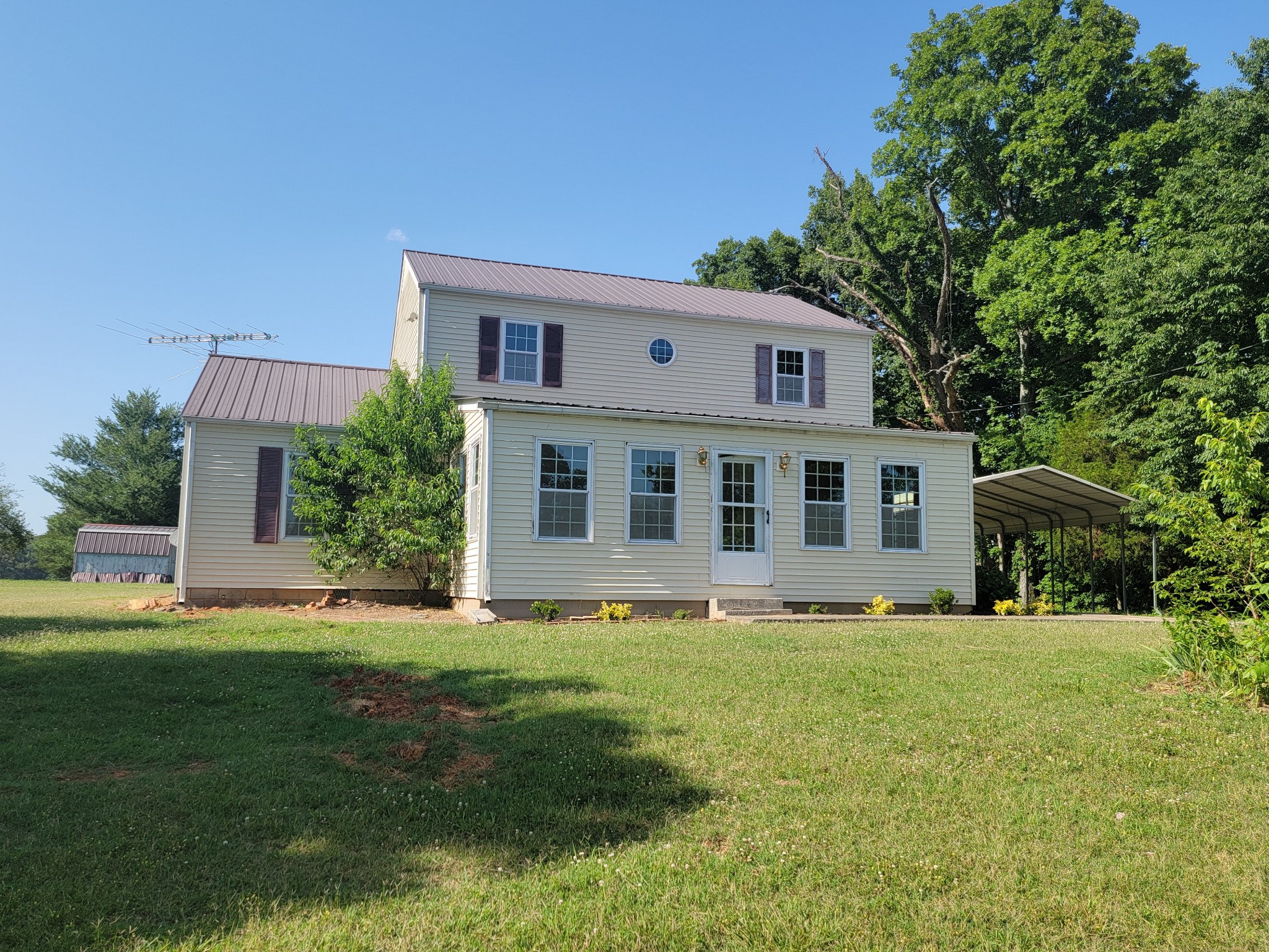5814 Wayman Dunn Road Springfield, TN 37172 - Photo 63 of 65 a front view of a house with a yard and trees