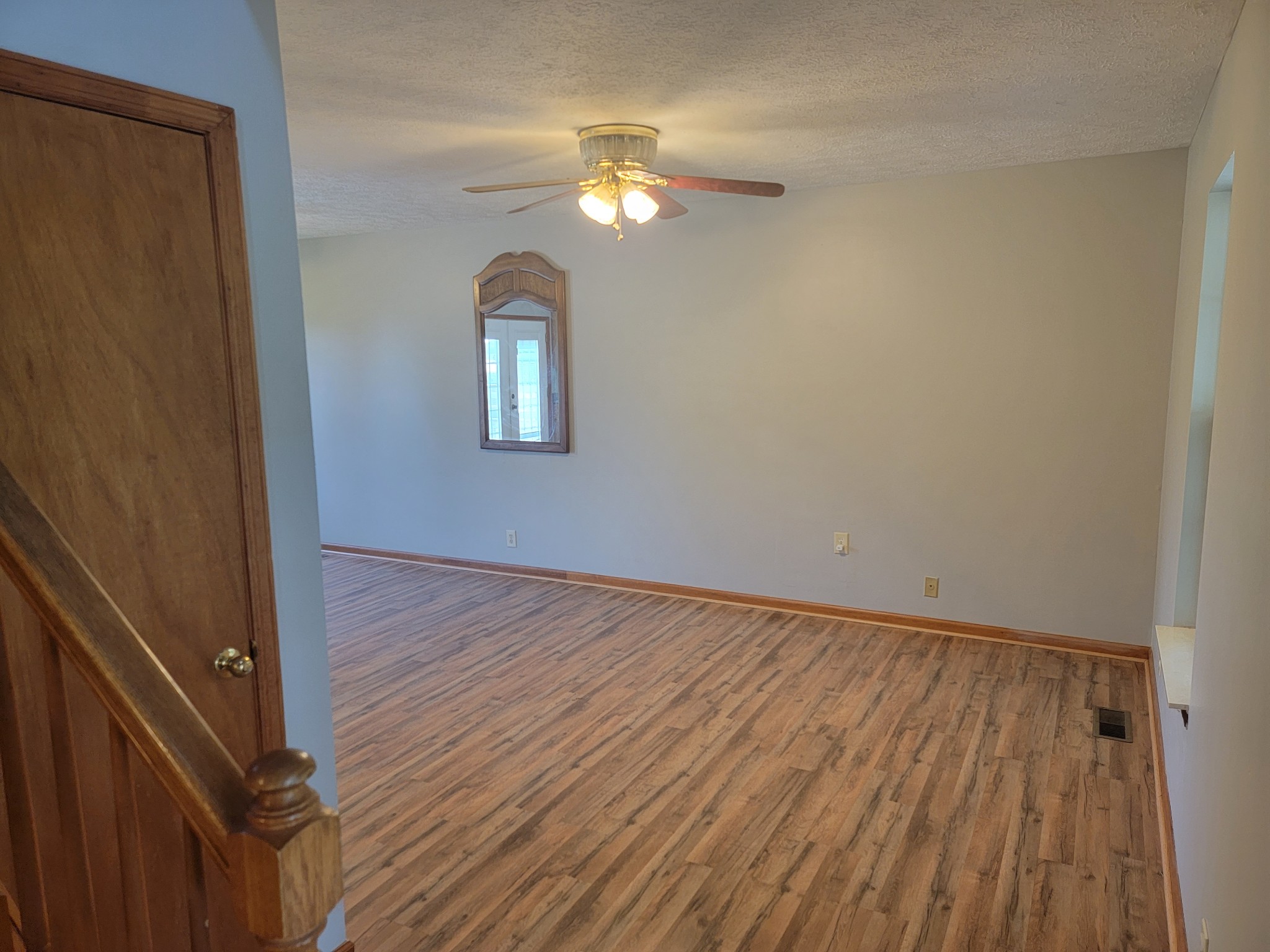 5814 Wayman Dunn Road Springfield, TN 37172 - Photo 9 of 65 a view of a room with wooden floor and a window