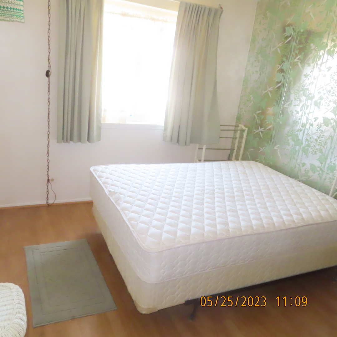 1566 Cornell Circle, Unit 1566 Hoffman Estates, IL 60169 - Photo 3 of 4 a bed sitting in a bathroom next to a window