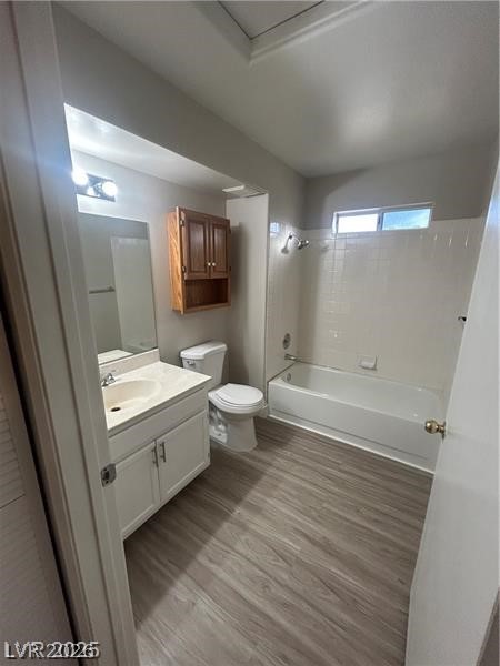 9070 Spring Mountain Road, Unit 210 Las Vegas, NV 89117 - Photo 11 of 12 This bright bathroom features a spacious tub and contemporary vanity, offering comfortable utility.