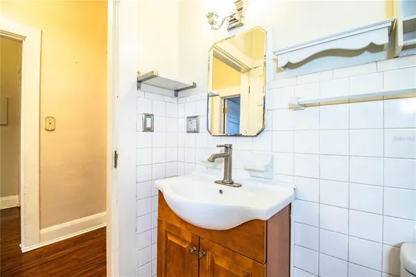 a view of an empty room with a bathroom