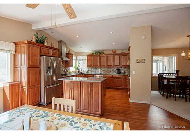 2204 Lookout Mountain Road Fallbrook, CA 92028 - Photo 11 of 25 ...large center island & high end GE Profile Stainless Appliances including wine refrigerator & professional stainless range hood.