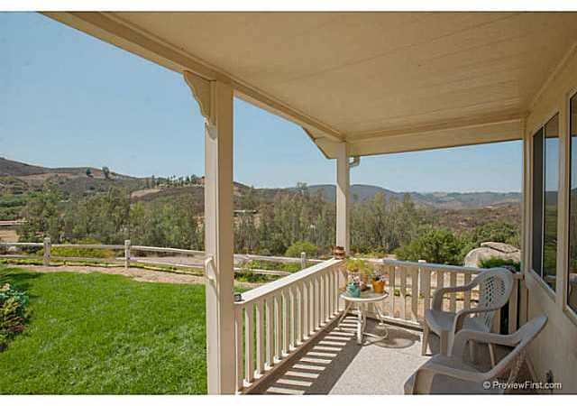 2204 Lookout Mountain Road Fallbrook, CA 92028 - Photo 3 of 25 The entry of the home has a lovely front patio where you can sit and admire the views.