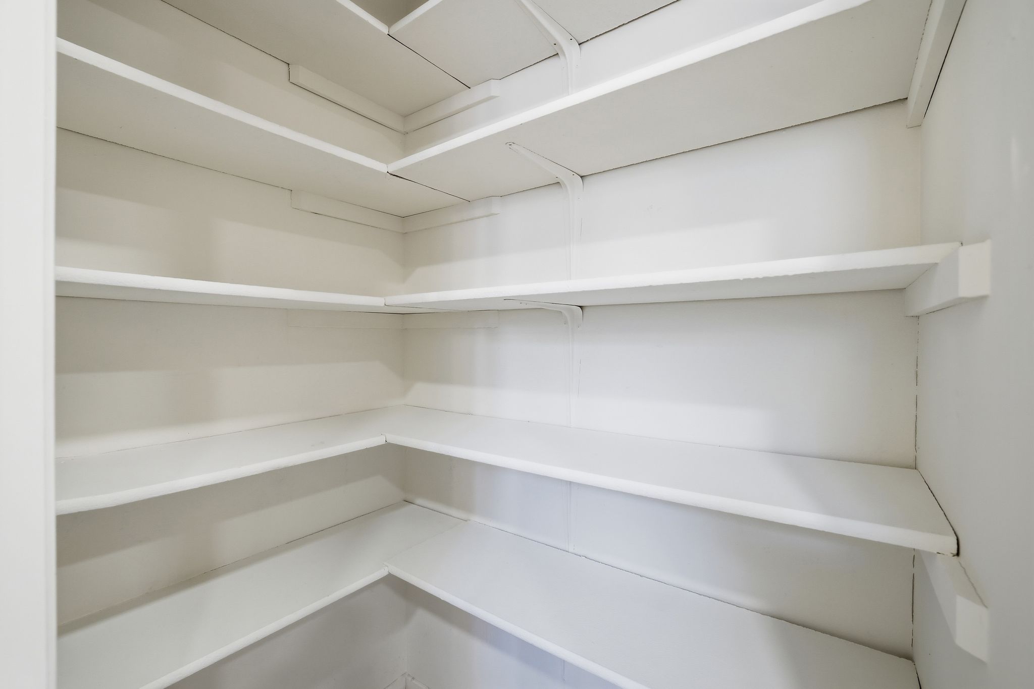 13004 Esplanade Street Austin, TX 78727 - Photo 14 of 38 a view of an empty walk in closet