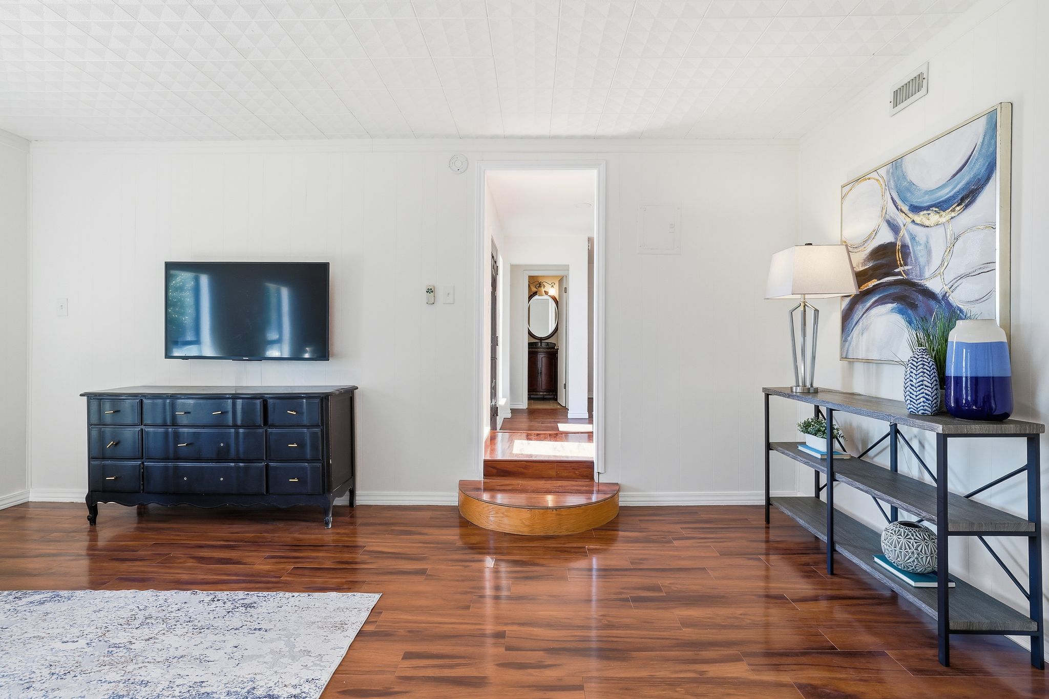 13004 Esplanade Street Austin, TX 78727 - Photo 19 of 38 a living room with furniture a piano and a window