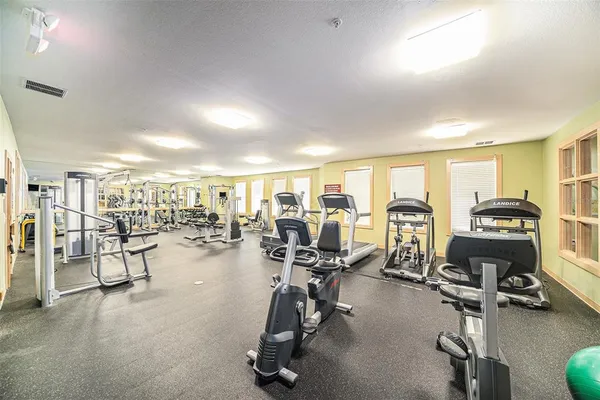 a view of a room with gym equipment