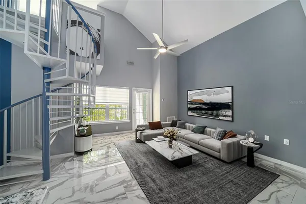 a living room with furniture fireplace and a flat screen tv