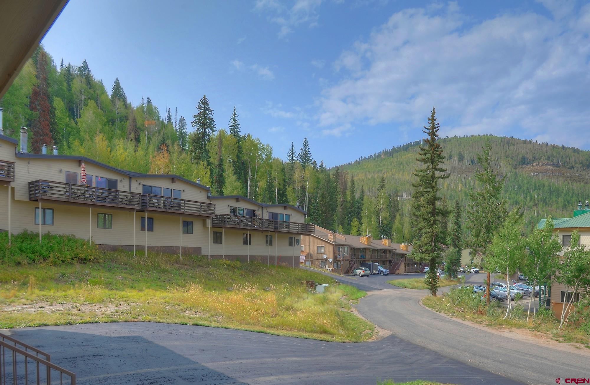 322 Sheol Street, Unit 7 Durango, CO 81301 - Photo 2 of 35 a view of a swimming pool with a patio