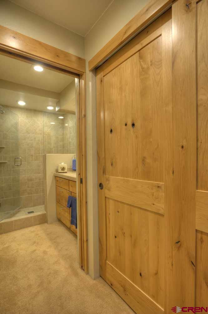 322 Sheol Street, Unit 7 Durango, CO 81301 - Photo 20 of 35 a bathroom with a shower and a sink