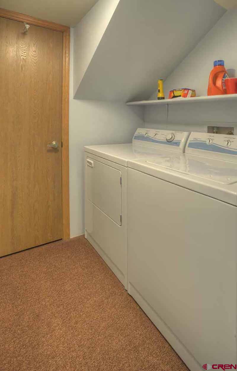 322 Sheol Street, Unit 7 Durango, CO 81301 - Photo 29 of 35 a utility room with dryer and washer