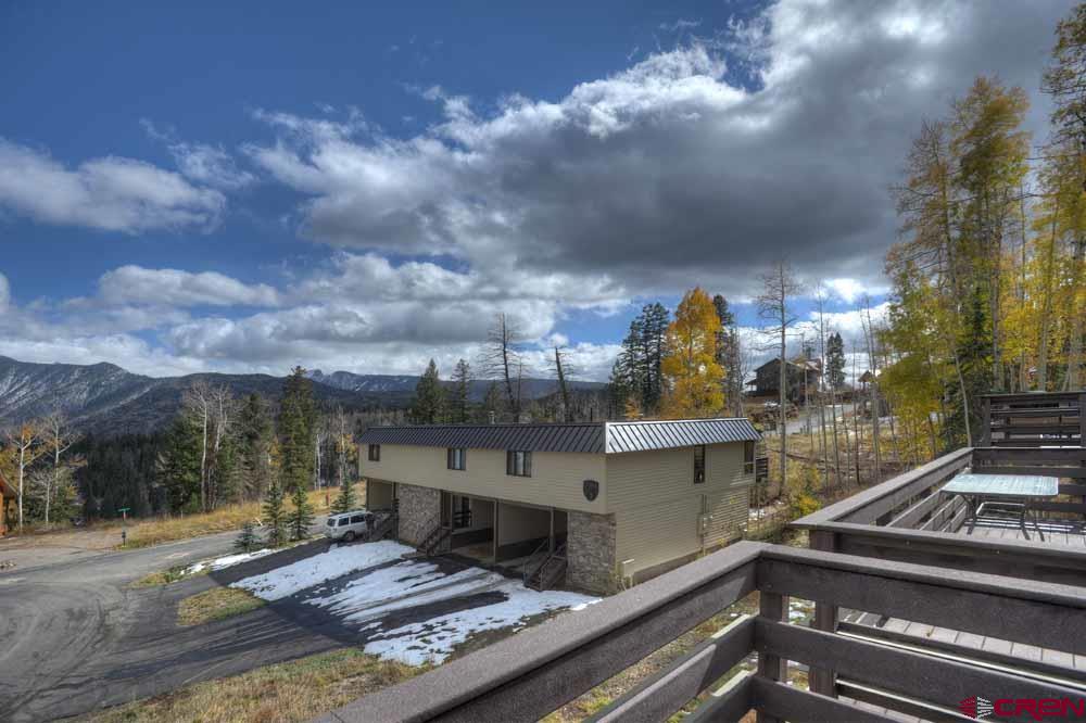 322 Sheol Street, Unit 7 Durango, CO 81301 - Photo 31 of 35 a view of a roof deck with chair and wooden floor