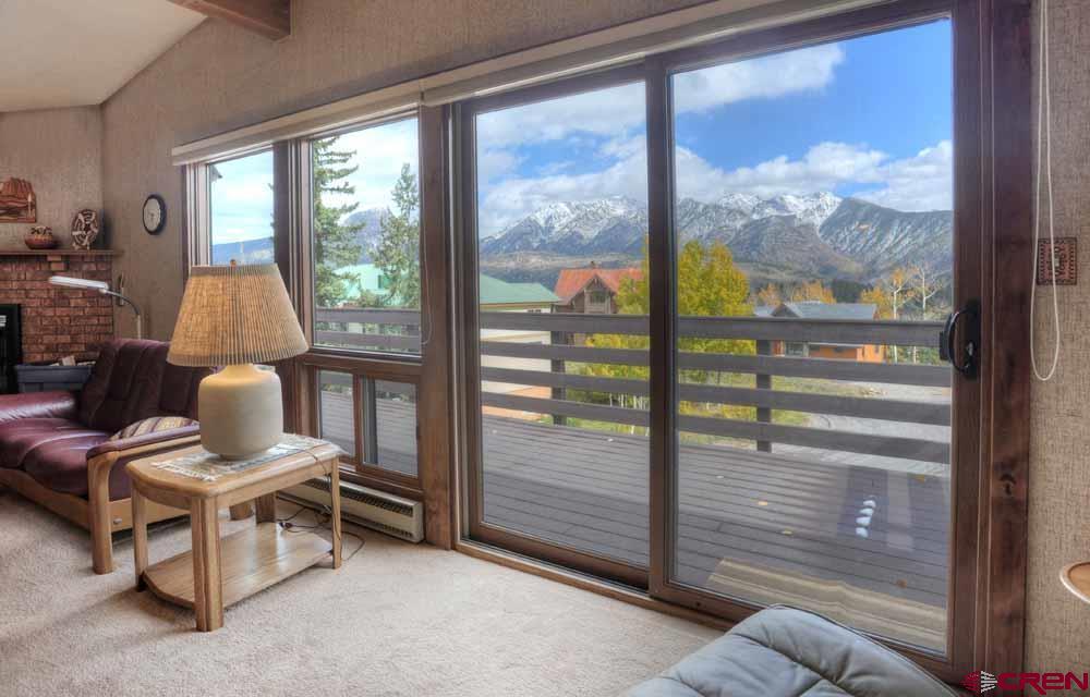 322 Sheol Street, Unit 7 Durango, CO 81301 - Photo 8 of 35 a view of a two room with furniture and window
