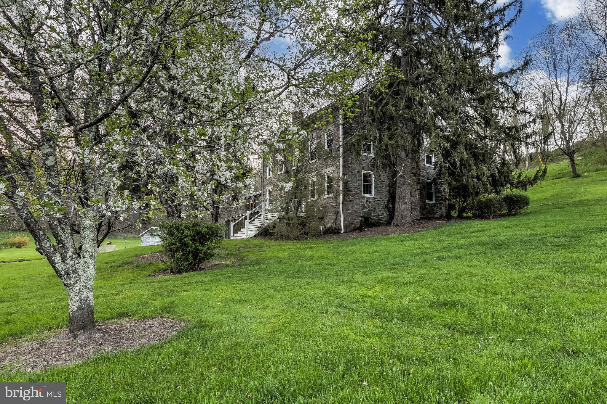 1449 Corbett Road Monkton, MD 21111 - Photo 9 of 34 a view of a backyard with large trees