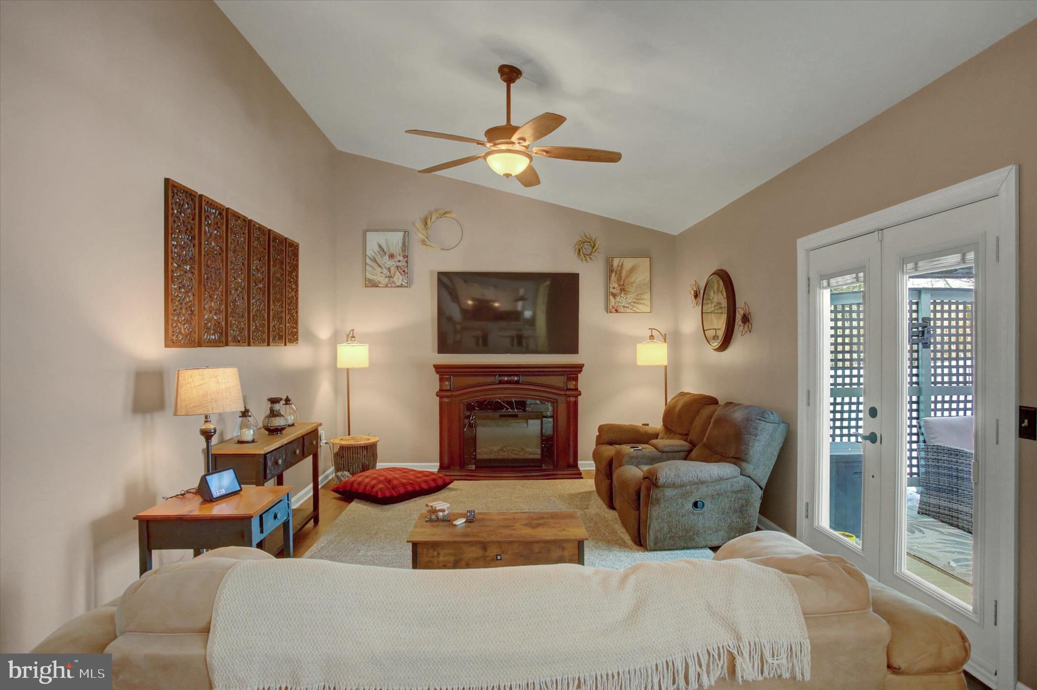 65 Ridgeview Drive Etters, PA 17319 - Photo 20 of 50 a bedroom with furniture a fireplace and ceiling fan