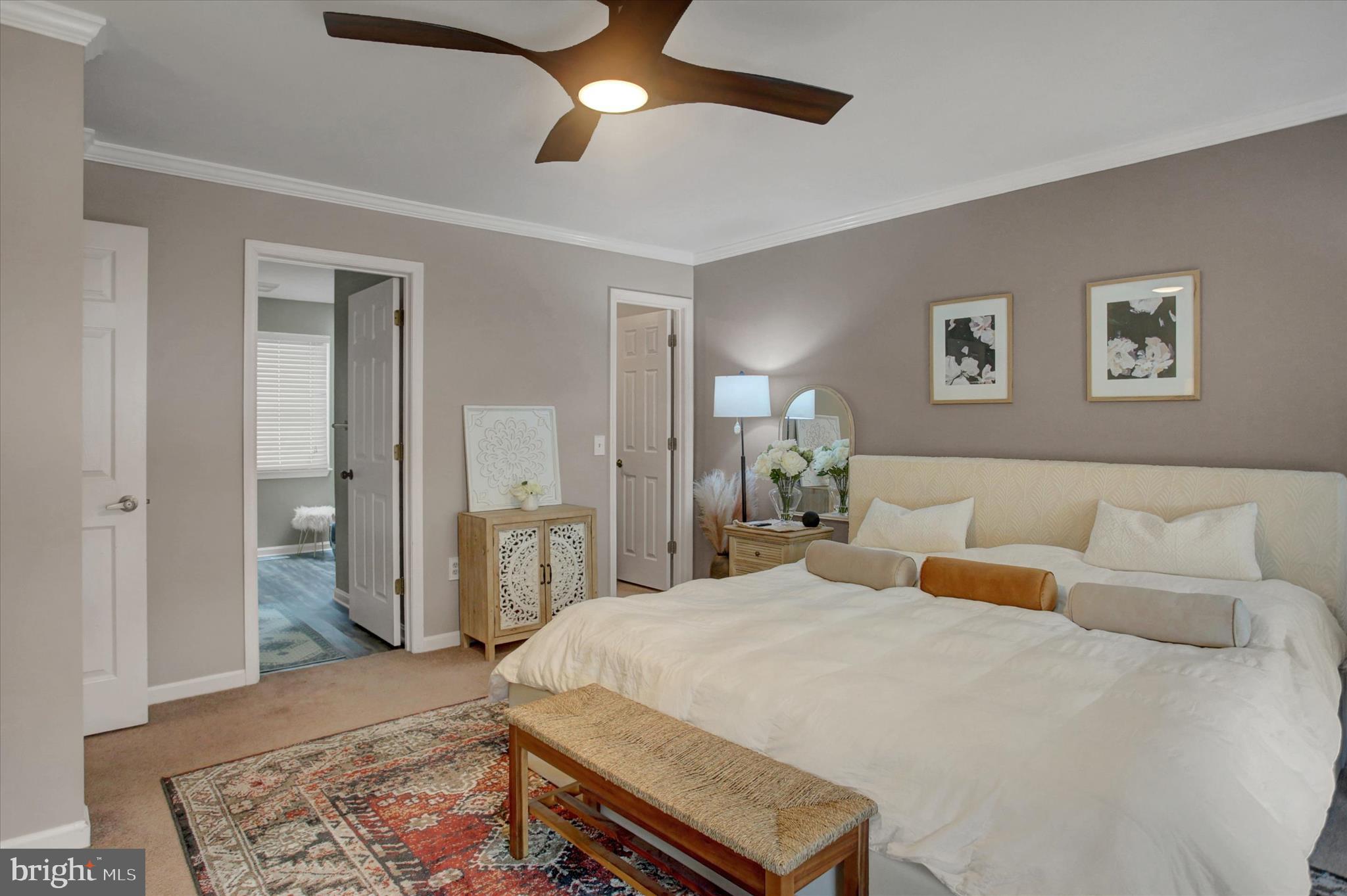 65 Ridgeview Drive Etters, PA 17319 - Photo 37 of 50 a bedroom with a bed and a chandelier