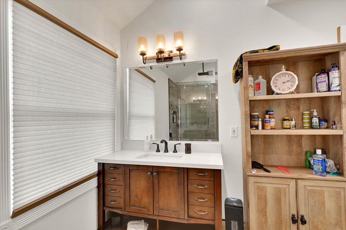 203 Tennessee Lane Bangor, CA 95901 - Photo 23 of 54 a bathroom with a sink and a mirror