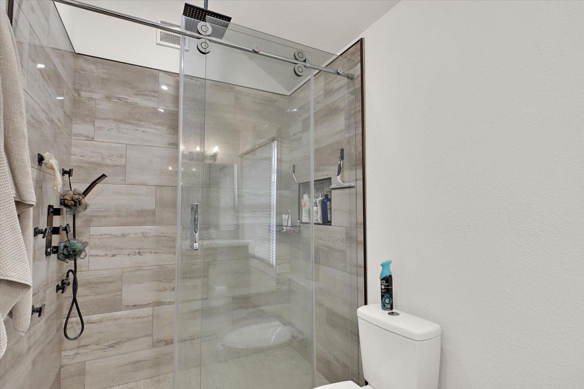 203 Tennessee Lane Bangor, CA 95901 - Photo 25 of 54 a bathroom with a shower and toilet