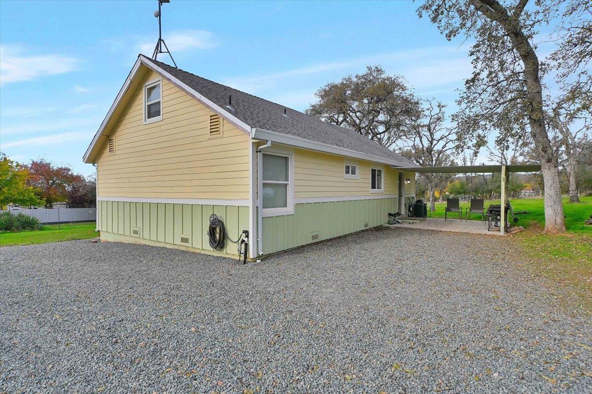 203 Tennessee Lane Bangor, CA 95901 - Photo 29 of 54 a view of a house with a yard and garage