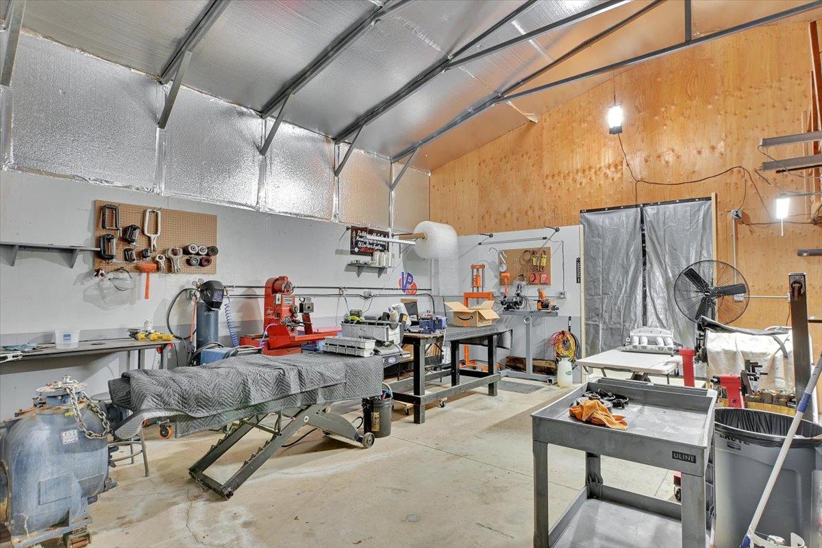 203 Tennessee Lane Bangor, CA 95901 - Photo 37 of 54 a room with gym equipment and a table