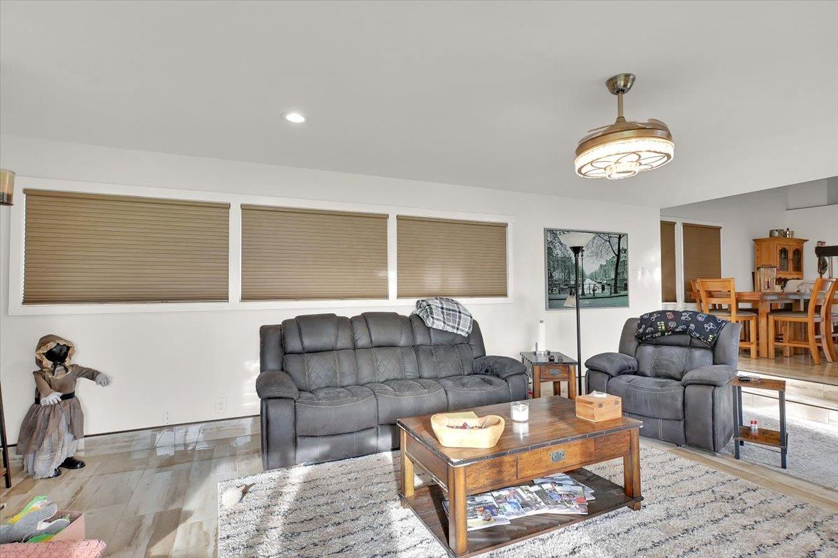 203 Tennessee Lane Bangor, CA 95901 - Photo 7 of 54 a living room with furniture and a chandelier