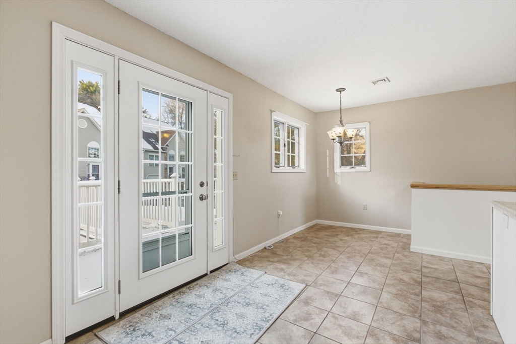 18 Palmer Road, Unit 6 Monson, MA 01057 - Photo 19 of 42 a view of an empty room with windows