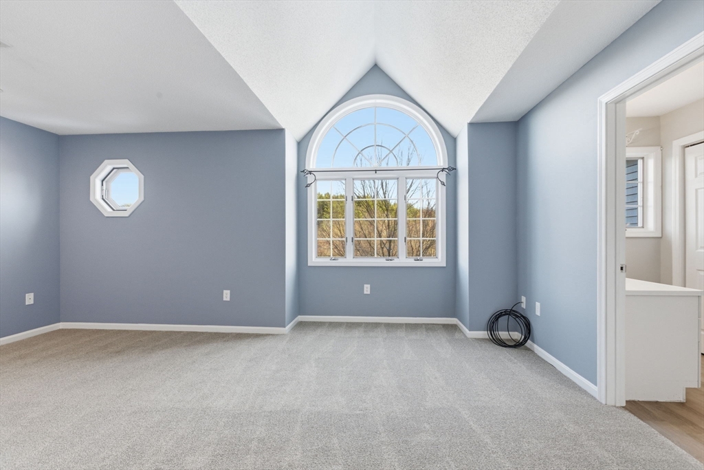18 Palmer Road, Unit 6 Monson, MA 01057 - Photo 22 of 42 an empty room with windows