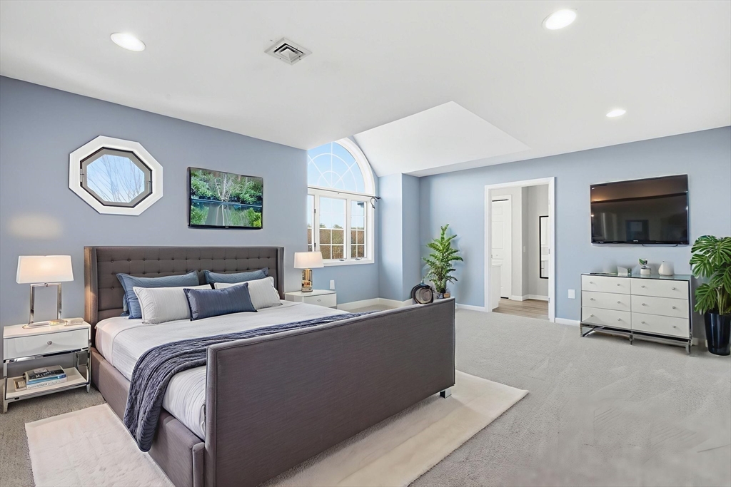 18 Palmer Road, Unit 6 Monson, MA 01057 - Photo 25 of 42 a bedroom with a bed and a couch