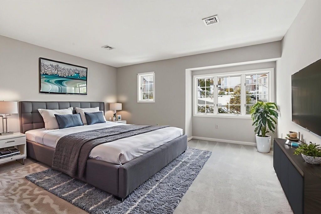 18 Palmer Road, Unit 6 Monson, MA 01057 - Photo 30 of 42 a bedroom with bed couch and window