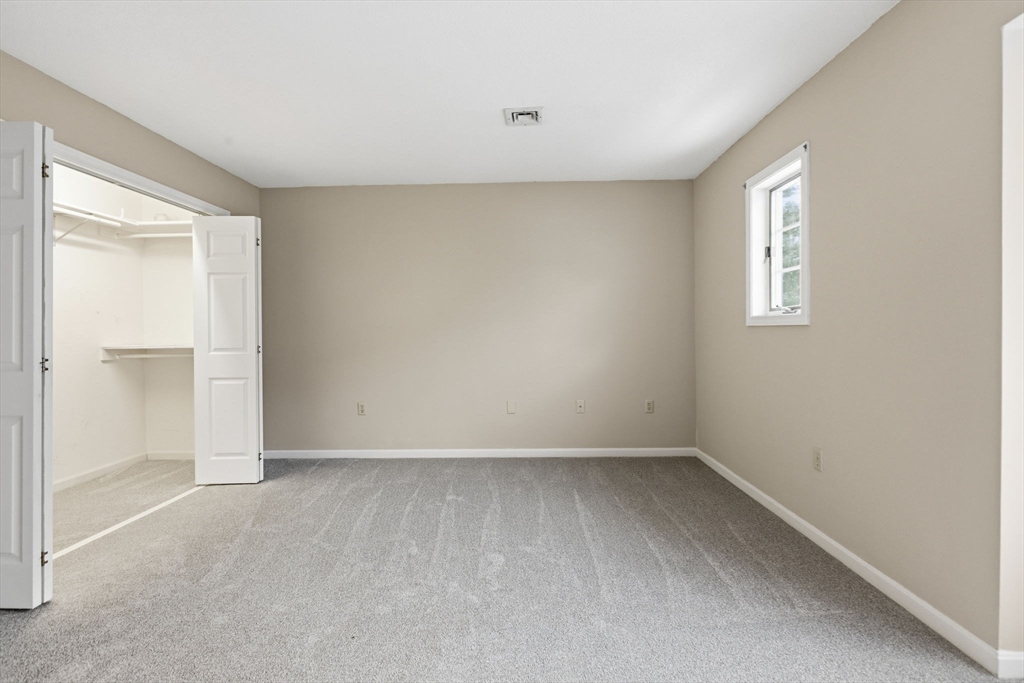 18 Palmer Road, Unit 6 Monson, MA 01057 - Photo 31 of 42 a view of an empty room with a window