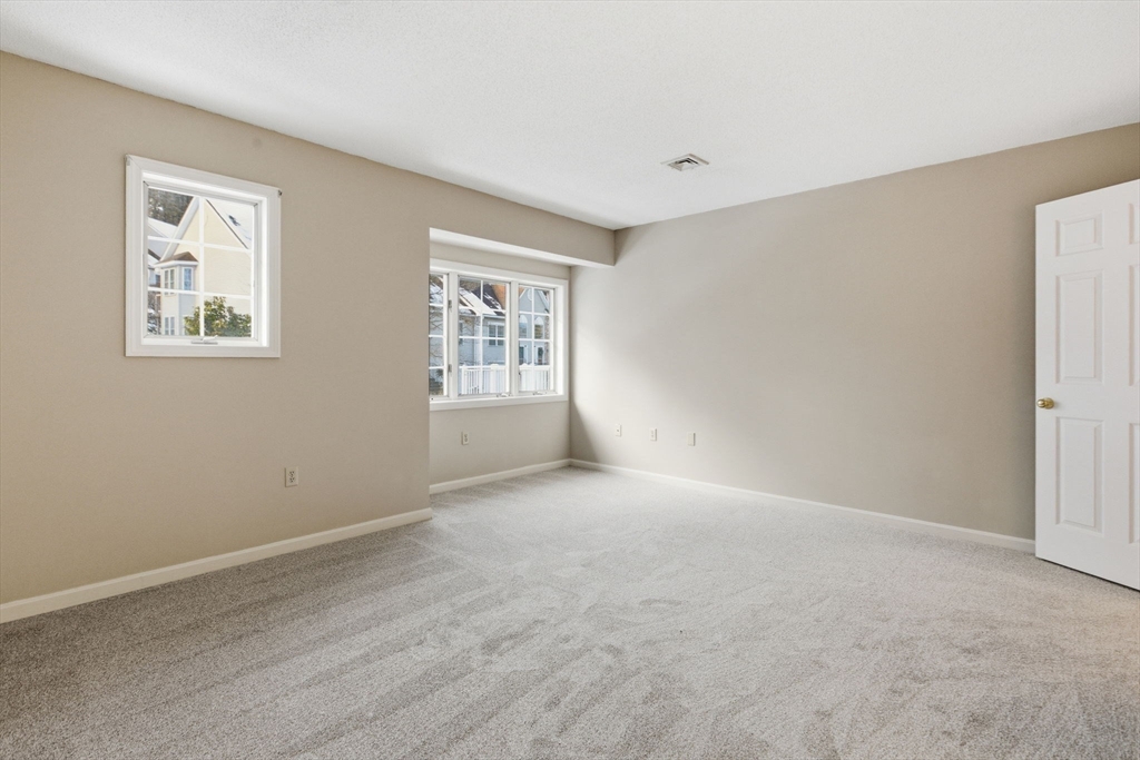 18 Palmer Road, Unit 6 Monson, MA 01057 - Photo 33 of 42 a view of an empty room with a window