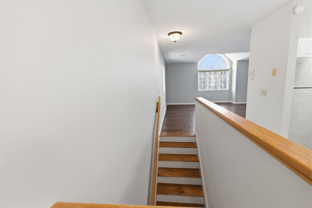 18 Palmer Road, Unit 6 Monson, MA 01057 - Photo 4 of 42 a view of entryway and hall with wooden floor