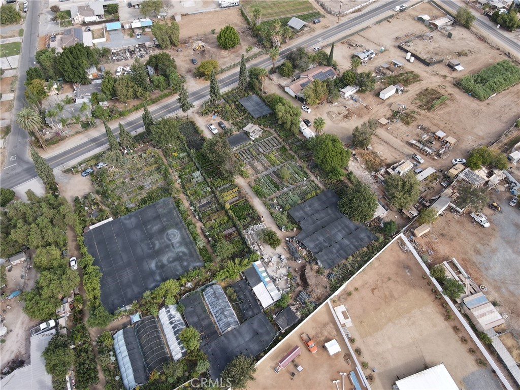 an aerial view of house with yard