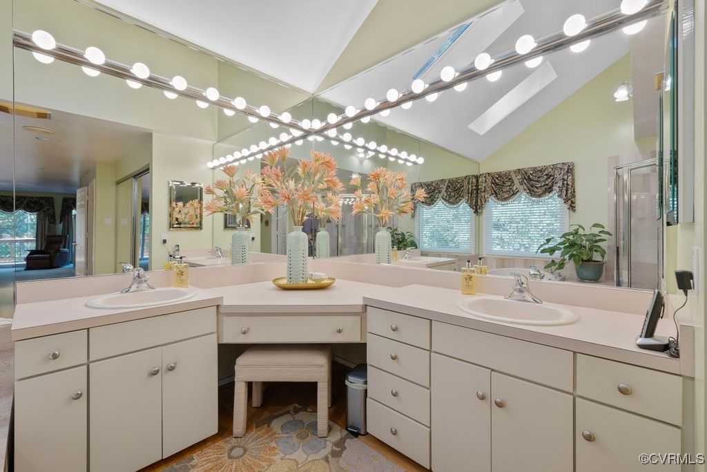 14006 Harbour Pointe Road Midlothian, VA 23112 - Photo 28 of 50 a bathroom with a sink vanity and a mirror
