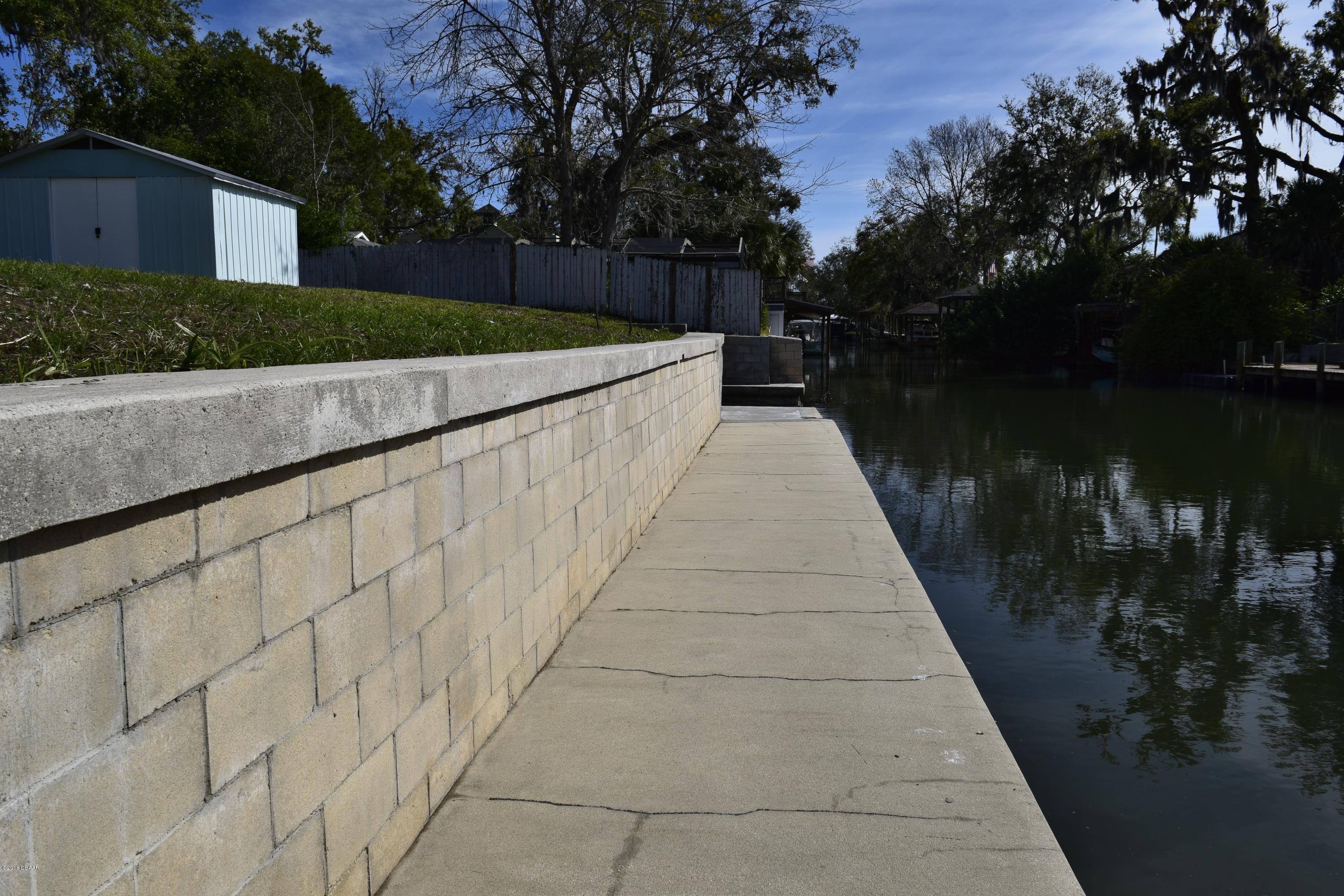 168 Azalea Road Edgewater, FL 32141 - Photo 24 of 28 seawall