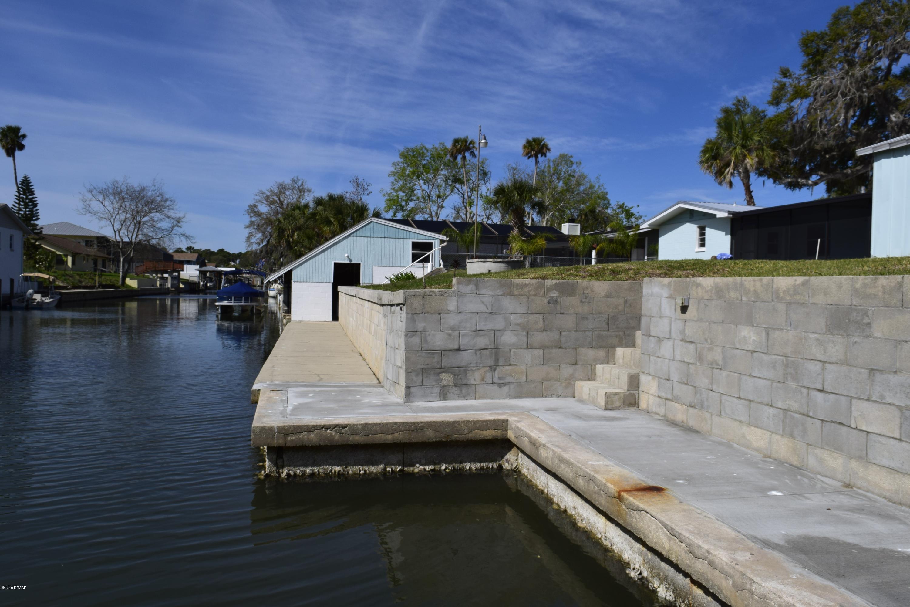168 Azalea Road Edgewater, FL 32141 - Photo 25 of 28 Sea Wall 3