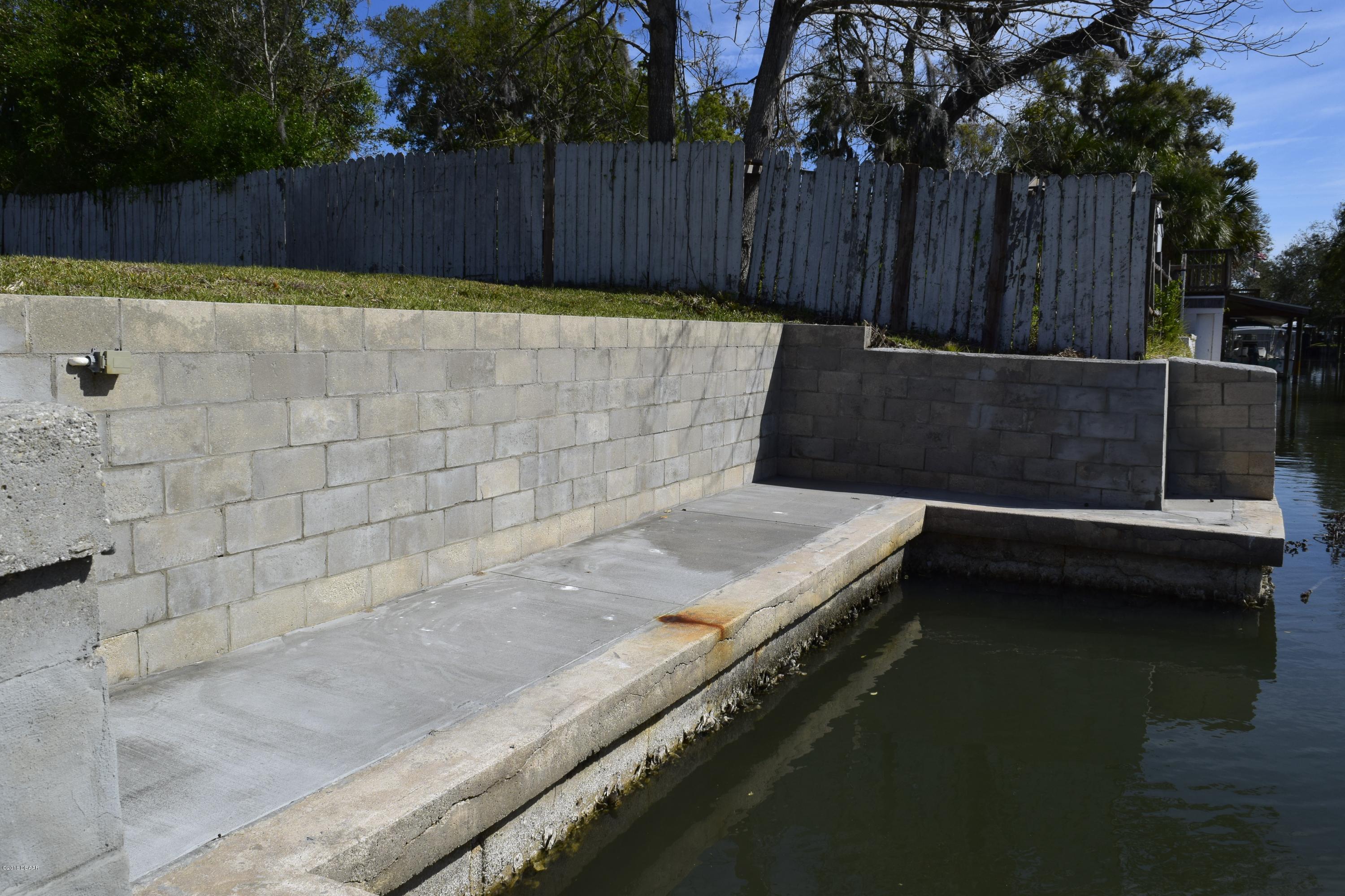 168 Azalea Road Edgewater, FL 32141 - Photo 26 of 28 Sea Wall
