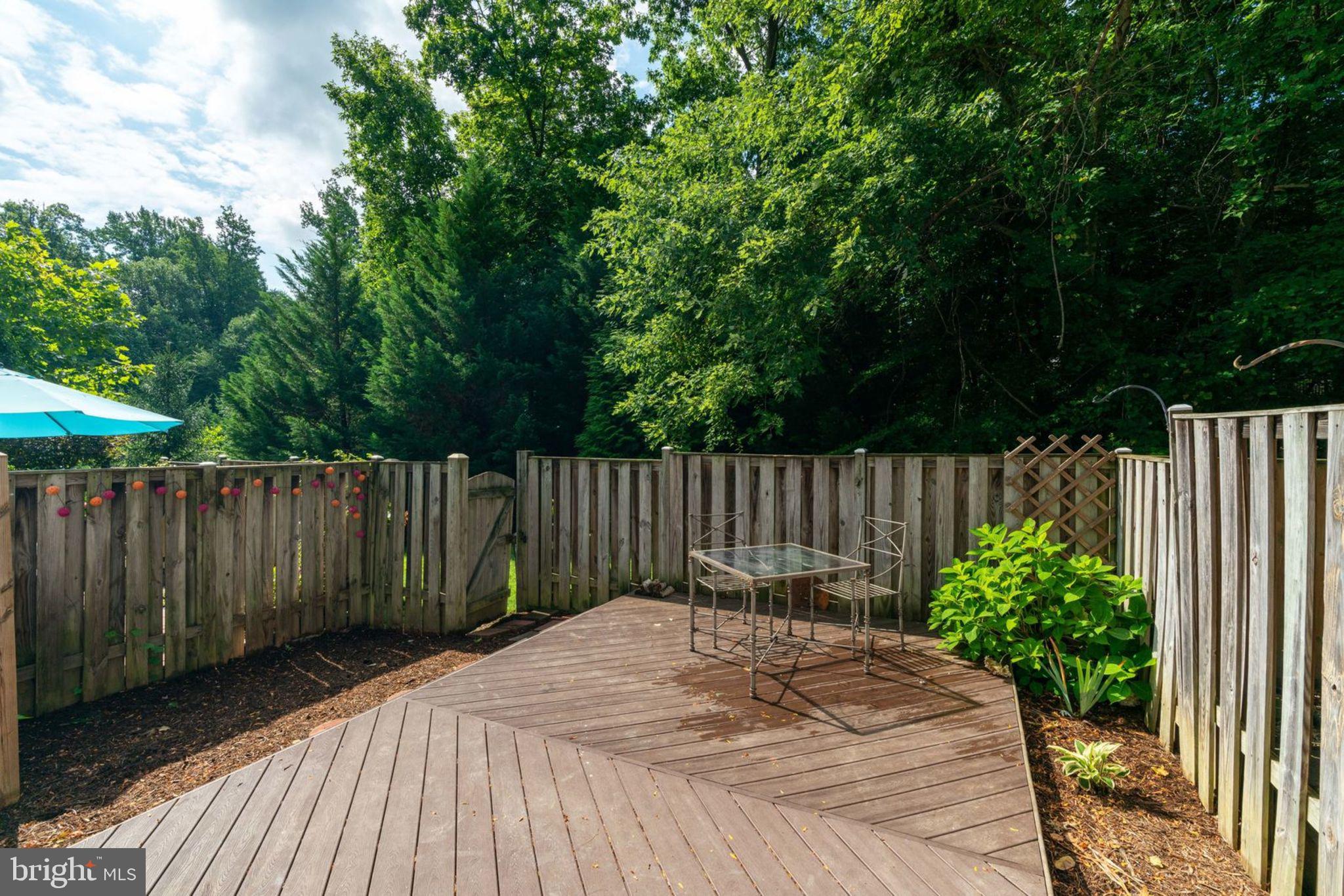 7903 Birchtree Court Springfield, VA 22152 - Photo 25 of 27 TREX DECK - BACKS TO WOODS